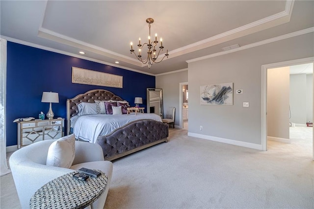 bedroom with baseboards, a tray ceiling, a notable chandelier, crown molding, and carpet flooring