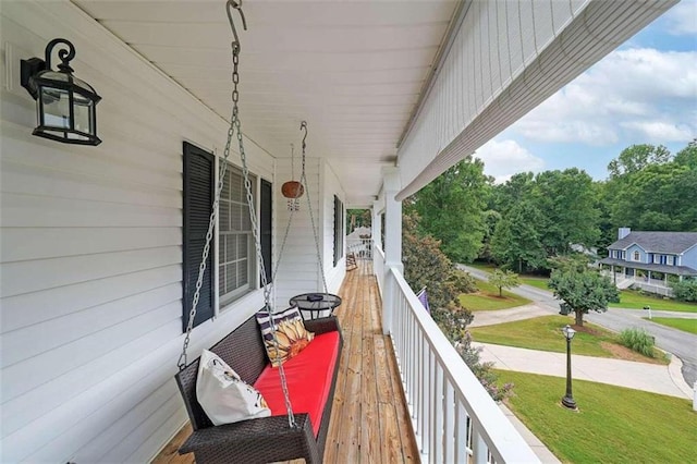 balcony featuring covered porch