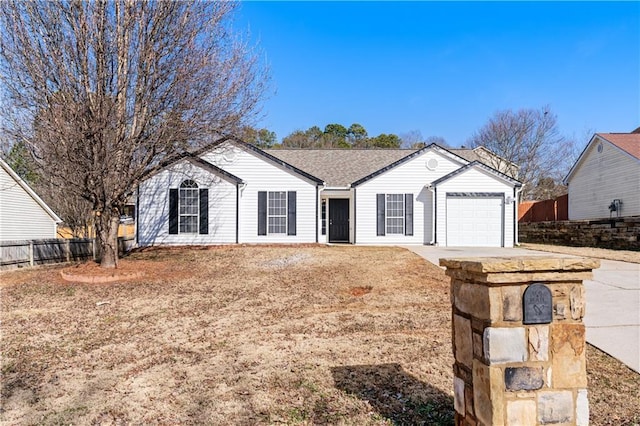 single story home with a garage