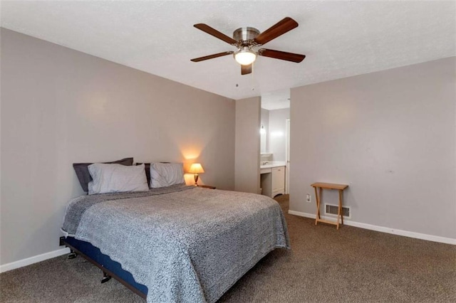 bedroom with carpet, visible vents, and baseboards