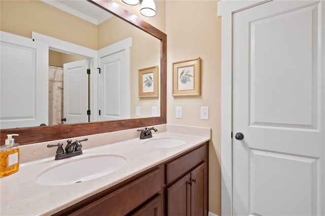 bathroom featuring dual sinks and oversized vanity