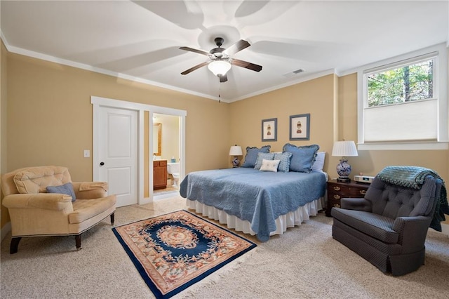 bedroom with ceiling fan, ensuite bathroom, and ornamental molding