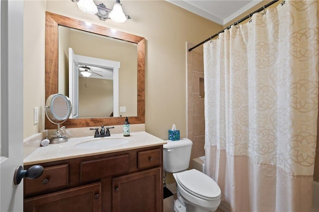 full bathroom with toilet, shower / tub combo, ceiling fan, and vanity with extensive cabinet space