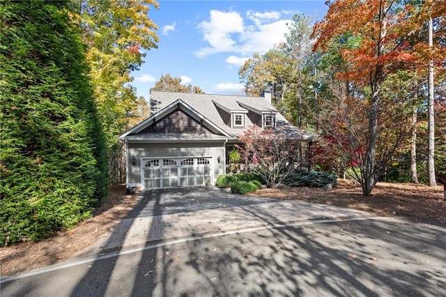 view of front of property with a garage