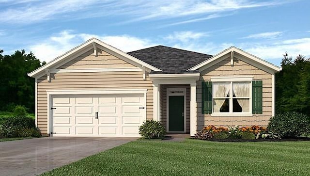 view of front of home featuring a garage and a front lawn