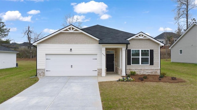 craftsman-style house featuring an attached garage, a front lawn, and concrete driveway