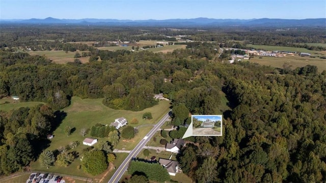 bird's eye view with a mountain view