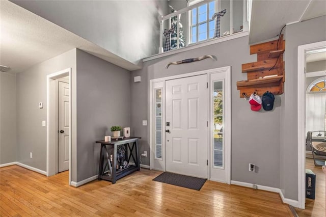 foyer with light hardwood / wood-style flooring