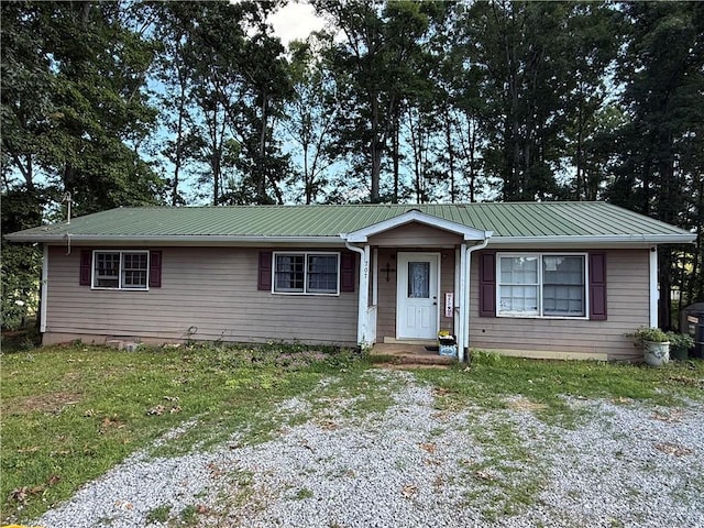 703 Jack Sharp Rd, Colbert, GA 30628 - ranch-style house featuring a metal roof and a front yard