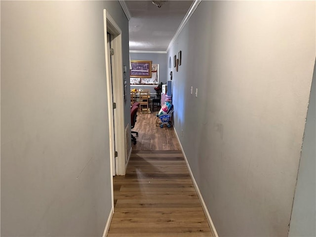 703 Jack Sharp Rd, Colbert, GA 30628 - corridor with crown molding, wood finished floors, and a desk