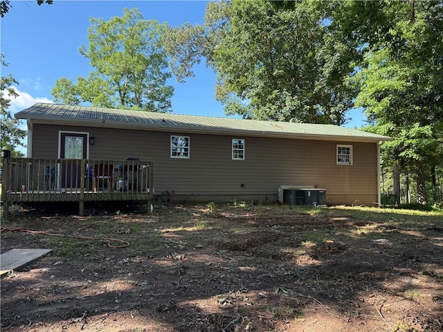 703 Jack Sharp Rd, Colbert, GA 30628 - back of house with a wooden deck and a metal roof