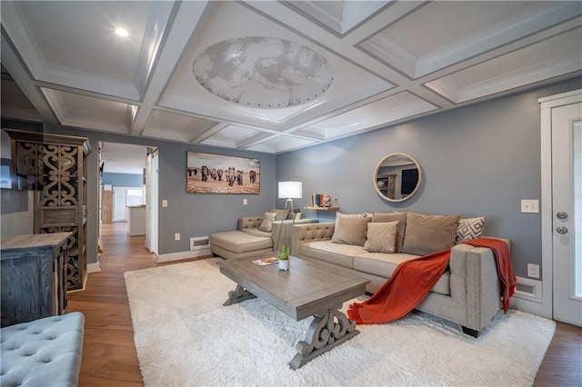 living room with coffered ceiling, beam ceiling, dark hardwood / wood-style flooring, and ornamental molding