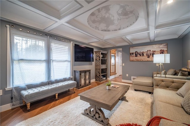 living room with hardwood / wood-style flooring, coffered ceiling, and beamed ceiling