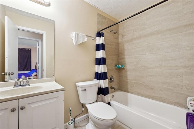 full bath featuring shower / bath combo with shower curtain, vanity, and toilet