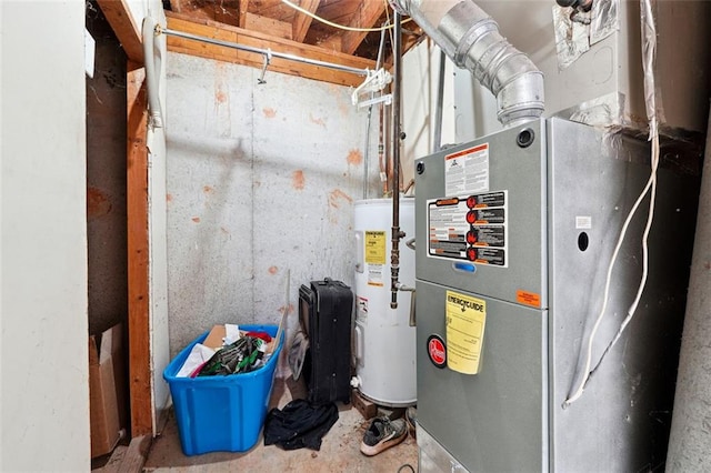 utility room featuring water heater and heating unit