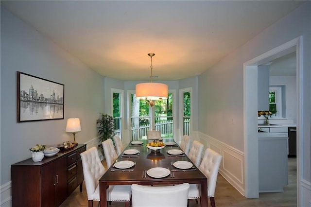 9050 Brockham Way, Alpharetta, GA 30022 - dining space with a wainscoted wall and wood finished floors