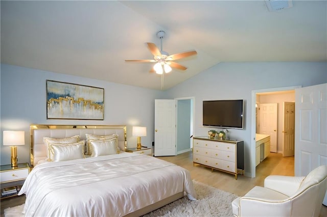 9050 Brockham Way, Alpharetta, GA 30022 - bedroom with vaulted ceiling, light wood-style floors, and ceiling fan