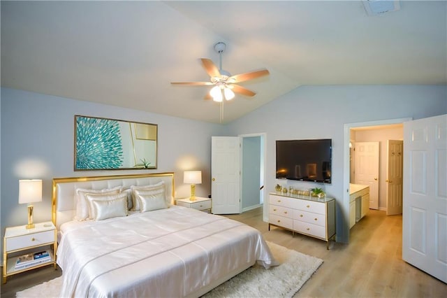 9050 Brockham Way, Alpharetta, GA 30022 - bedroom with vaulted ceiling, light wood finished floors, and ceiling fan