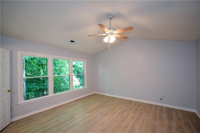 9050 Brockham Way, Alpharetta, GA 30022 - unfurnished room with light wood finished floors, a ceiling fan, baseboards, and lofted ceiling