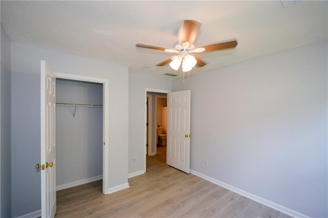 9050 Brockham Way, Alpharetta, GA 30022 - unfurnished bedroom featuring light wood-style floors, baseboards, a closet, and ceiling fan