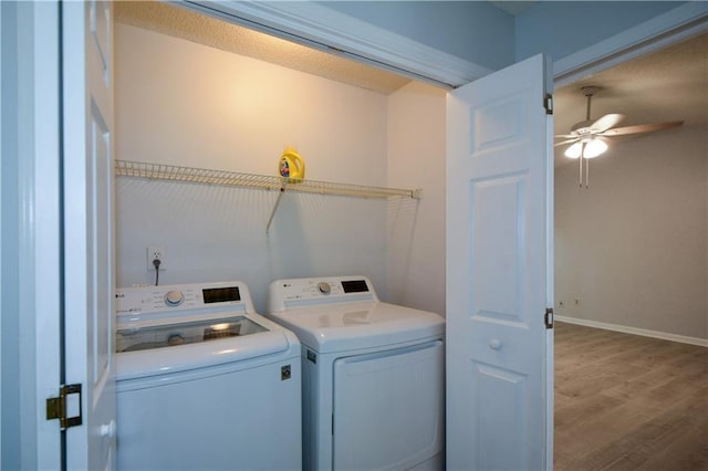9050 Brockham Way, Alpharetta, GA 30022 - laundry area featuring separate washer and dryer, wood finished floors, a ceiling fan, and baseboards