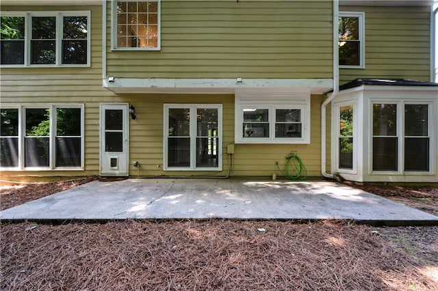9050 Brockham Way, Alpharetta, GA 30022 - back of house featuring a patio