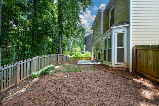 9050 Brockham Way, Alpharetta, GA 30022 - fenced backyard featuring a patio area