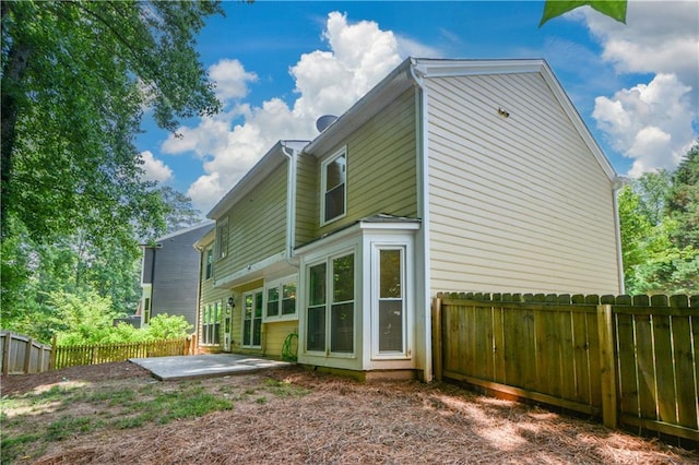 9050 Brockham Way, Alpharetta, GA 30022 - rear view of property featuring a patio area