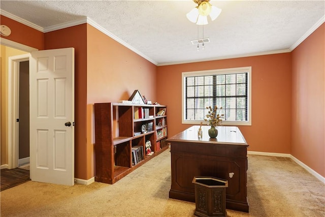 carpeted office space featuring ceiling fan, a textured ceiling, and ornamental molding