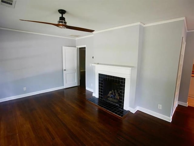 unfurnished living room featuring baseboards, visible vents, a tile fireplace, wood finished floors, and crown molding