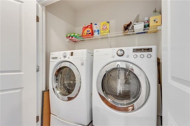 laundry area with laundry area and washer and dryer