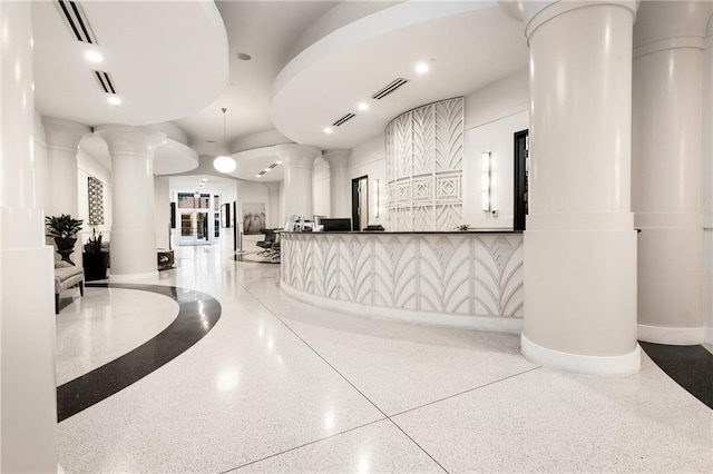 reception featuring visible vents and ornate columns