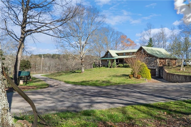 view of street with a barn