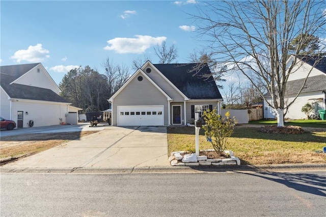 view of front property with a front yard and a garage