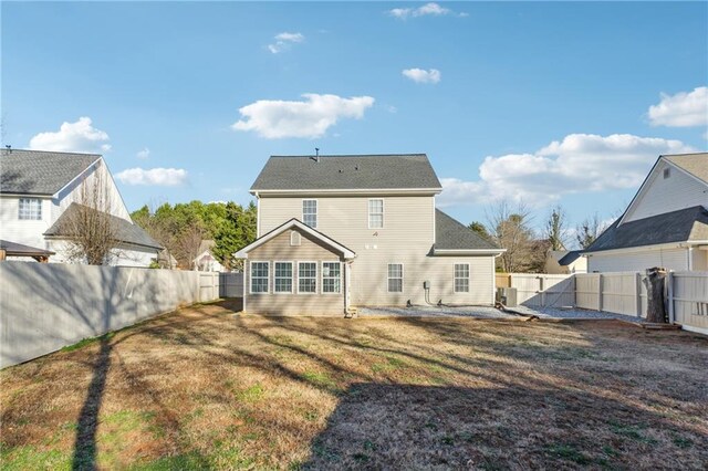 rear view of property featuring cooling unit