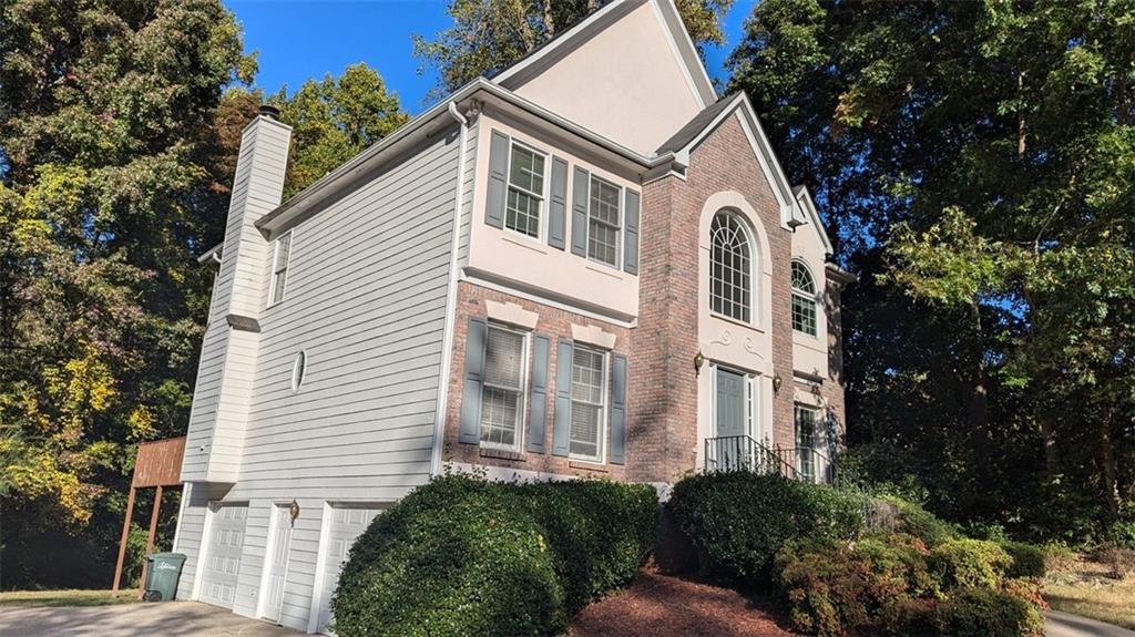 view of home's exterior with a garage