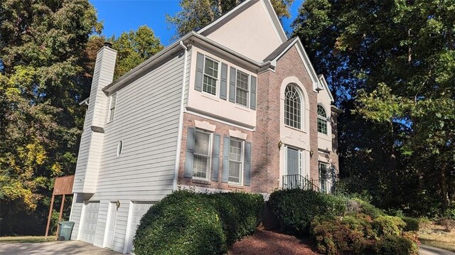 view of home's exterior with a garage