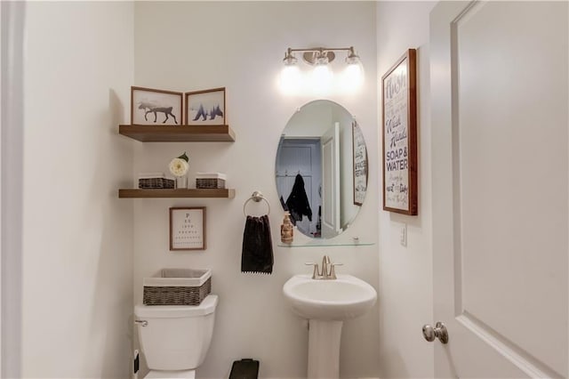 bathroom featuring toilet