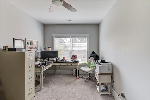 office featuring light colored carpet and ceiling fan