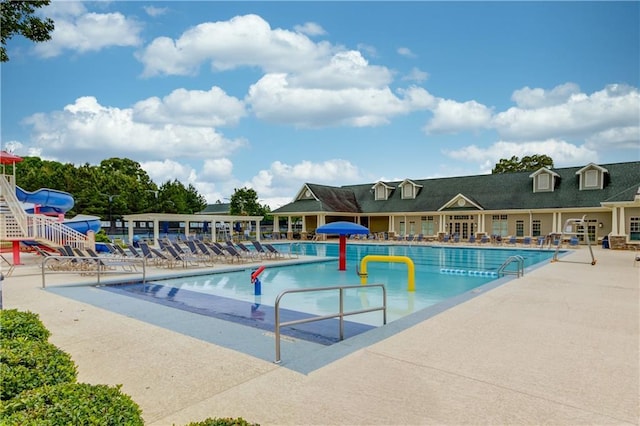 view of pool featuring a patio