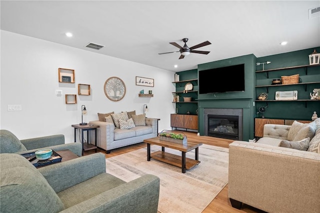 232 Northridge Dr, Dallas, GA 30132 - living room with a ceiling fan, light wood-style floors, a glass covered fireplace, and recessed lighting