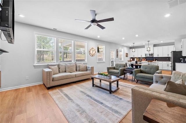 232 Northridge Dr, Dallas, GA 30132 - living room featuring a ceiling fan, light wood-style floors, baseboards, and recessed lighting