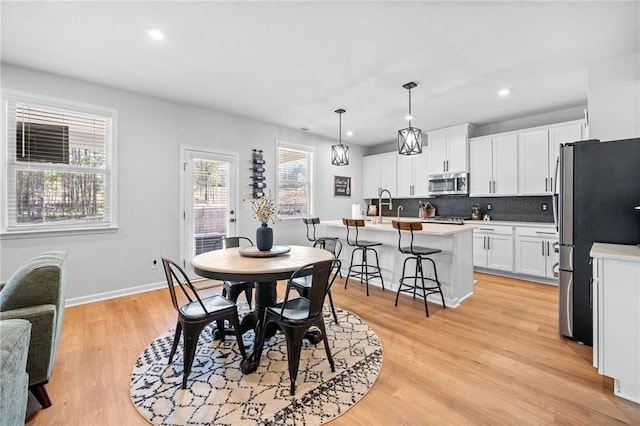 232 Northridge Dr, Dallas, GA 30132 - dining space featuring recessed lighting, light wood-type flooring, and baseboards