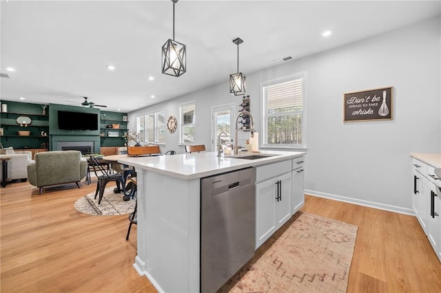 232 Northridge Dr, Dallas, GA 30132 - kitchen featuring dishwasher, a sink, white cabinets, healthy amount of natural light, and recessed lighting