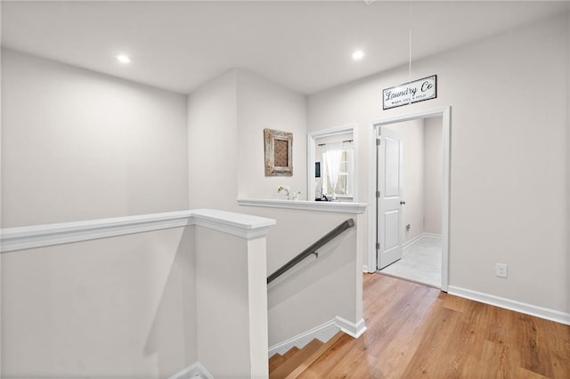 232 Northridge Dr, Dallas, GA 30132 - hall featuring an upstairs landing, light wood finished floors, recessed lighting, and baseboards