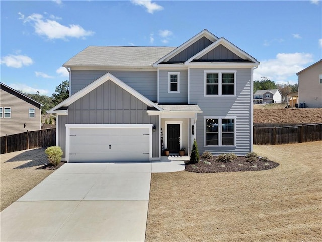 232 Northridge Dr, Dallas, GA 30132 - view of front of home with board and batten siding, fence, driveway, and a garage