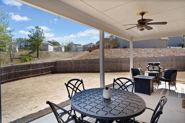 232 Northridge Dr, Dallas, GA 30132 - view of patio / terrace featuring outdoor dining area, a fenced backyard, a ceiling fan, a fire pit, and a grill