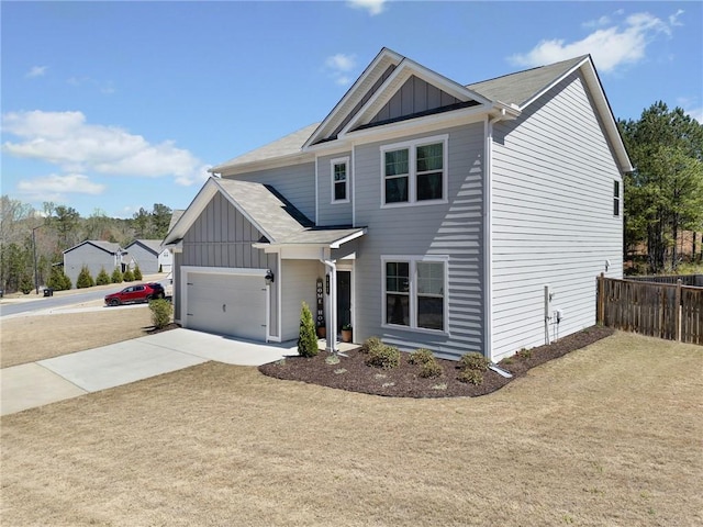 232 Northridge Dr, Dallas, GA 30132 - view of front of home featuring board and batten siding, fence, driveway, and an attached garage