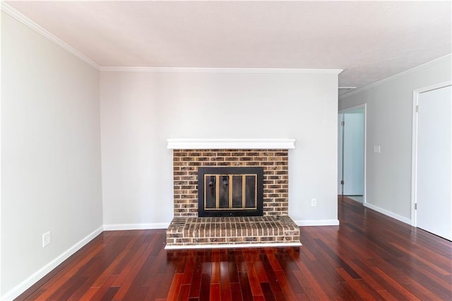 unfurnished living room with a fireplace, wood finished floors, baseboards, and ornamental molding