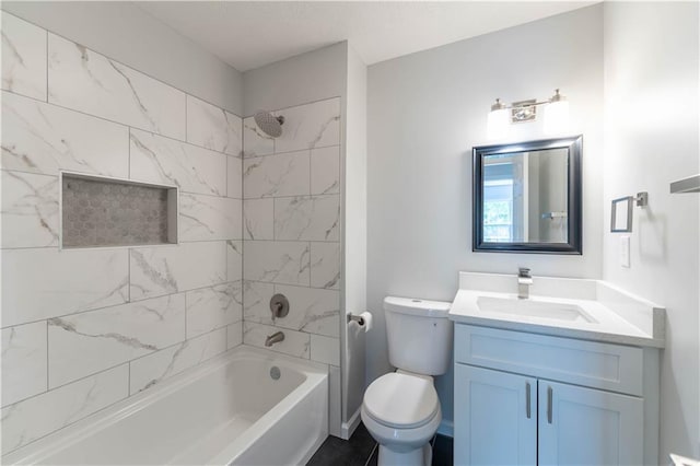 full bathroom featuring shower / bathtub combination, toilet, and vanity